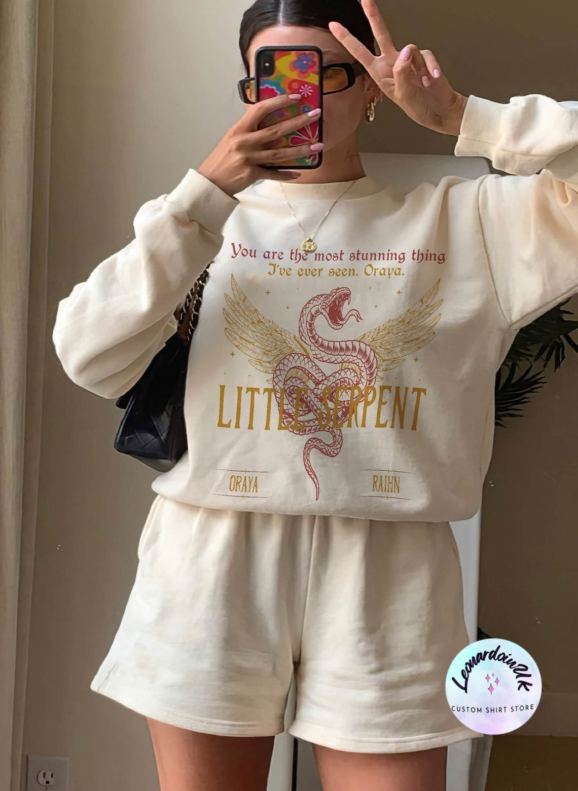 Oraya Little Serpent Sweatshirt, the Serpent and the Wings of Night Reading Sweater, Official Carissa Broadbent Merch