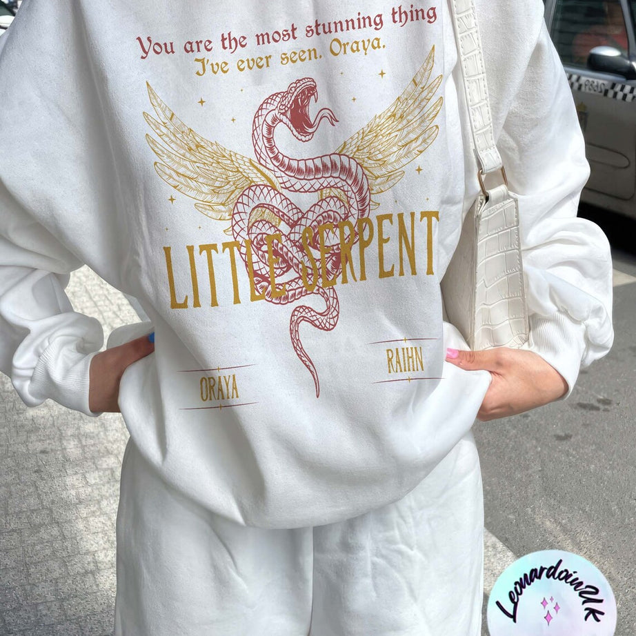 Oraya Little Serpent Sweatshirt, the Serpent and the Wings of Night Reading Sweater, Official Carissa Broadbent Merch