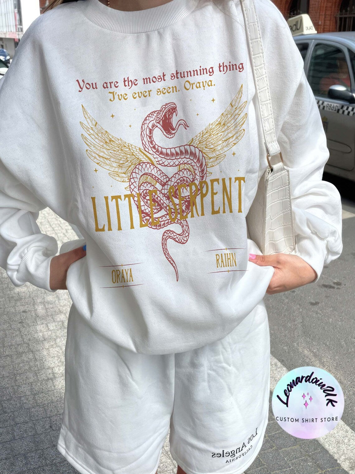 Oraya Little Serpent Sweatshirt, the Serpent and the Wings of Night Reading Sweater, Official Carissa Broadbent Merch