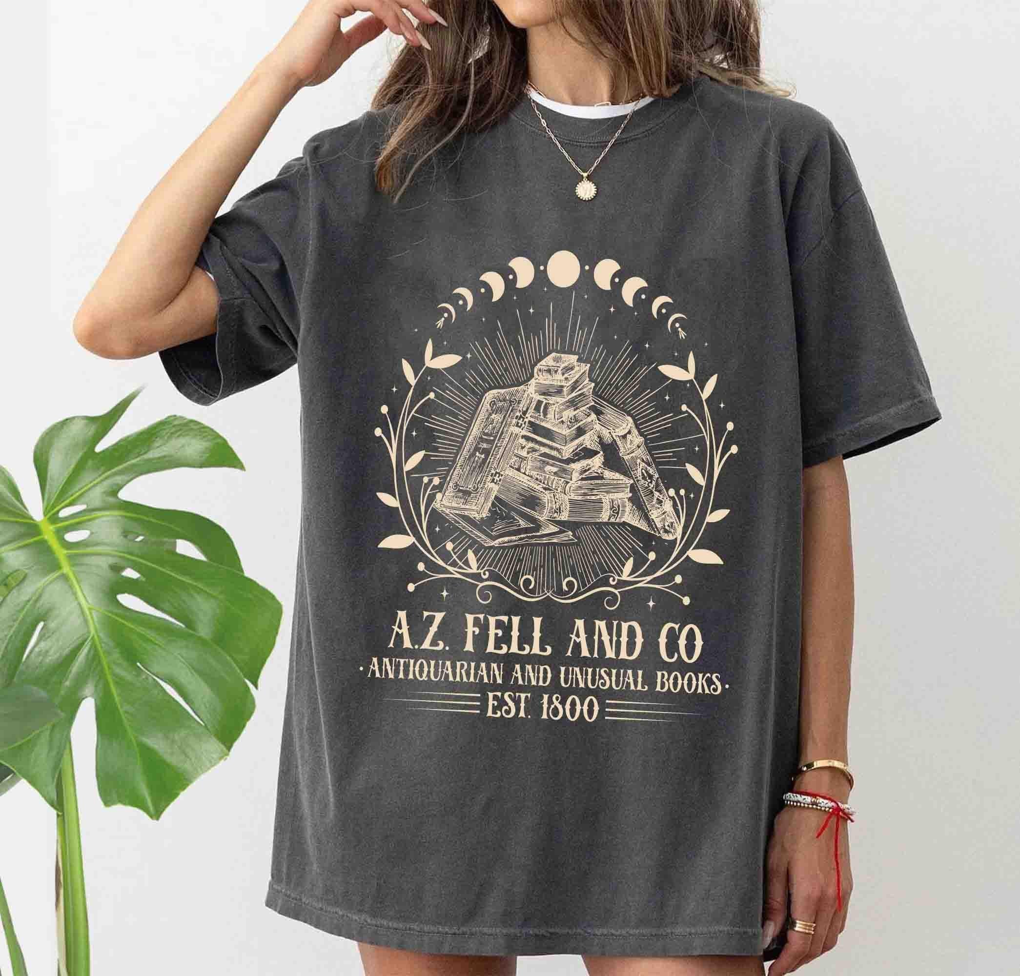 A.Z. FELL & CO Antiquities and Unusual Books Comfort Color Shirt, Good Omens Shirt, AZFELL Graphic S